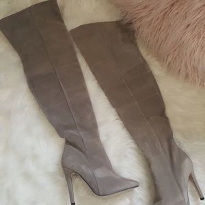 Thigh high gray heeled boots